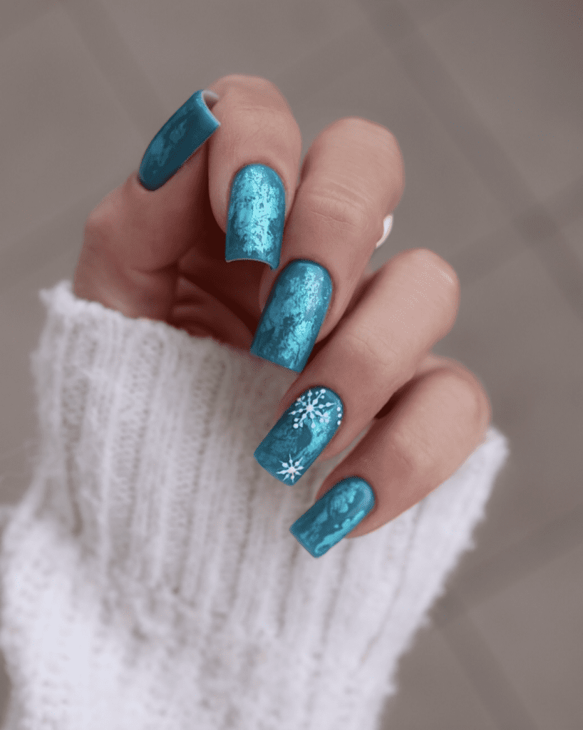 Teal Blue Snowflake Nails